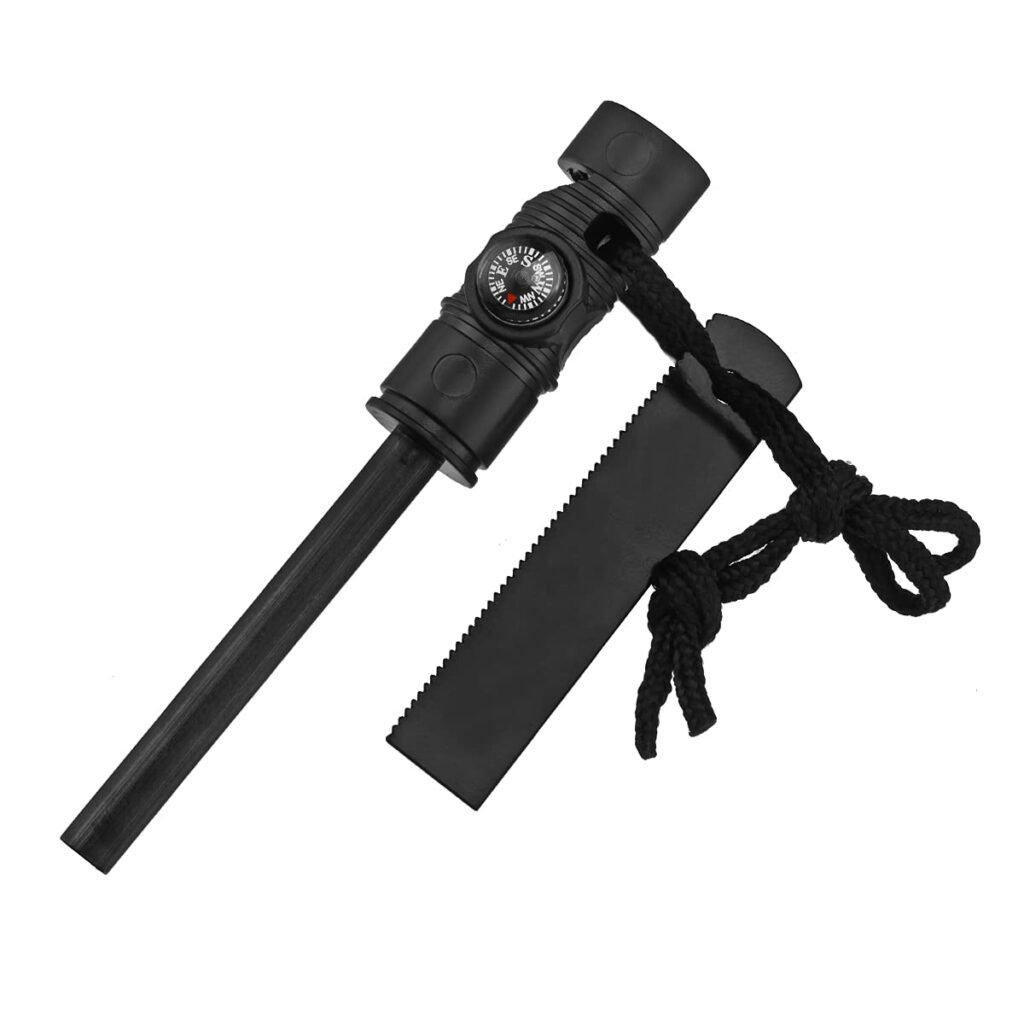 FRC52 multi-functional ferro rod with built-in navigation compass, black handle, emergency whistle, and a serrated steel scraper striker connected by a black paracord lanyard.