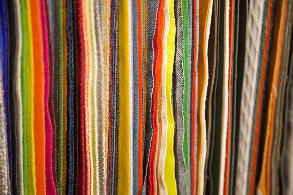 Assorted paracord offcuts and fabric edges in various colours, from a paracord manufacturer UK.