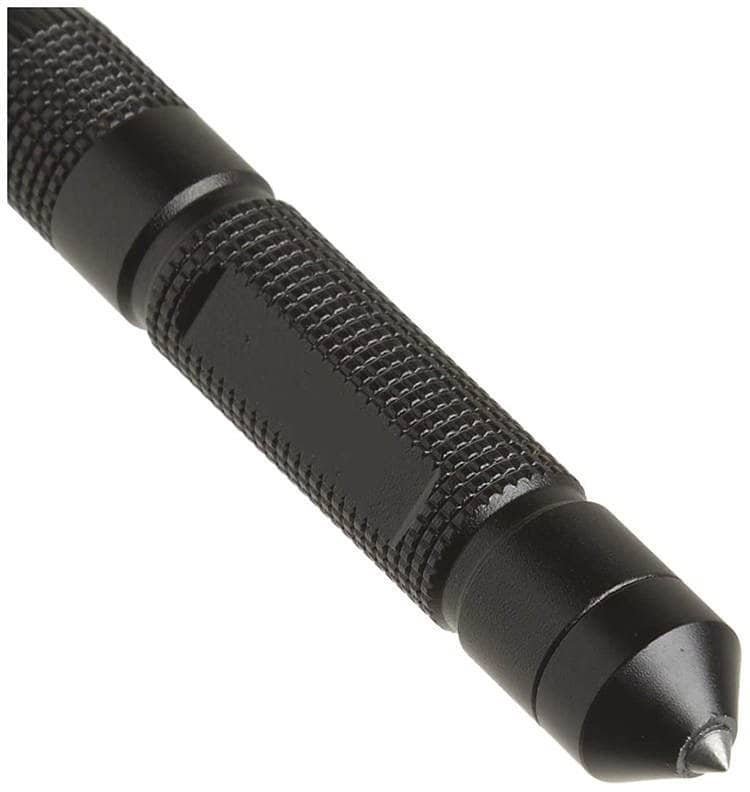Close-up of the knurled aluminum handle and tungsten steel glass breaker tip on a tactical wholesale fire starter kit for emergency defense.