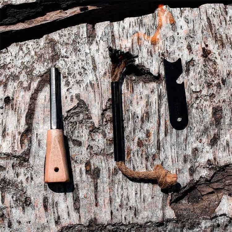 Steel scraper and ruler tool paired with a premium ferro rod bulk FRC19 for heavy-duty outdoor use.