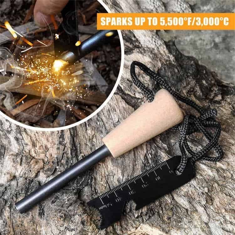 Hands using a tactical steel striker to scrape the ferro rod bulk FRC31 to produce a shower of high-heat sparks at a rugged outdoor bushcraft campsite.