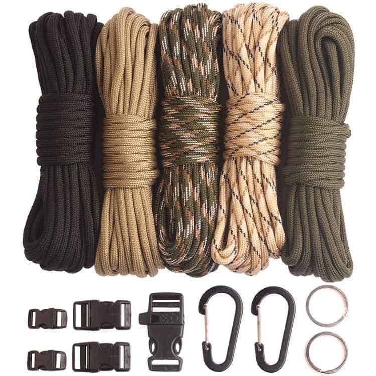A tactical crafting kit from a professional paracord manufacturer featuring 5 bundles of 20ft bulk paracord in various utility colors, complete with side-release buckles, black carabiners, and keyrings.