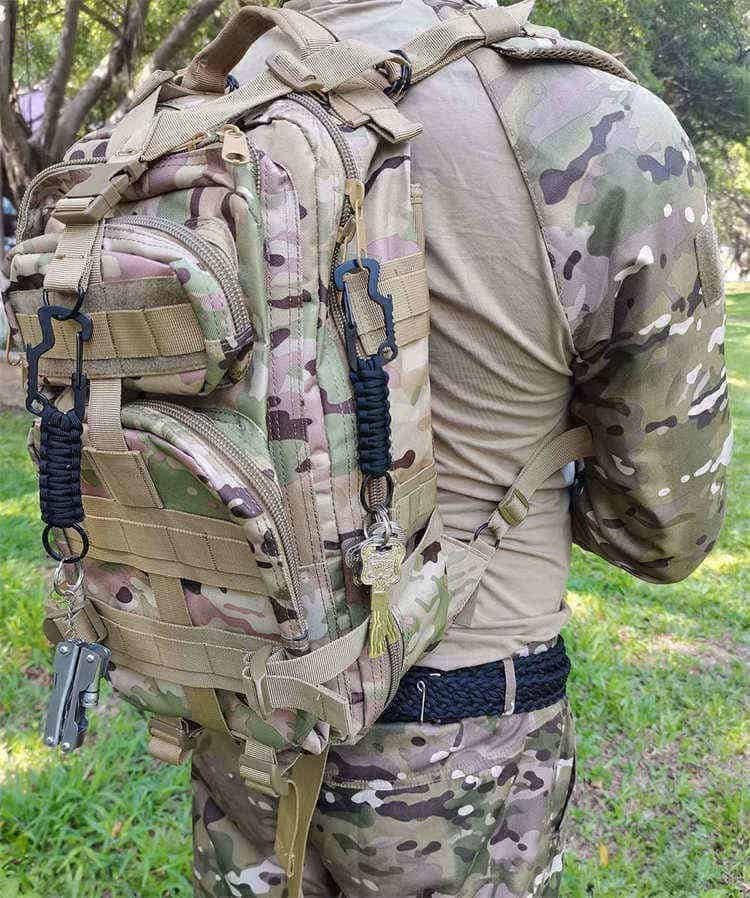 K04 paracord carabiner keychain mounted on a tactical backpack using wholesale paracord accessories