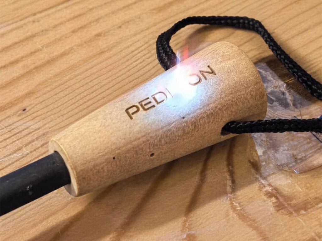 Wooden-handled ferro rod with customizable logo, wholesale fire starter kits.