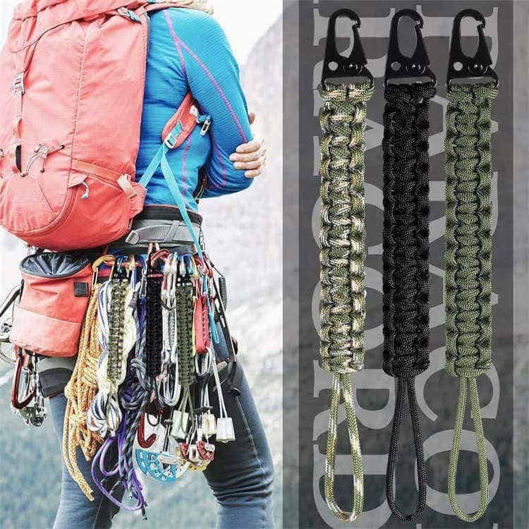 Heavy-duty PL02 wholesale paracord lanyard attached to outdoor backpack gear, produced by a tactical paracord lanyard manufacturer.