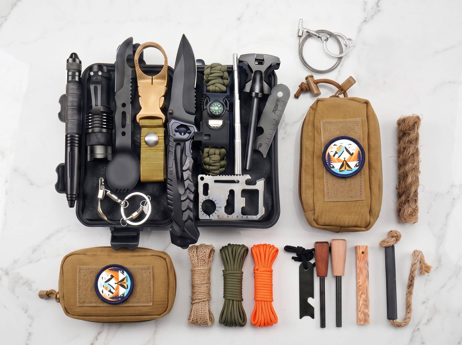 Complete survival fire starter kit with knives, tools, paracord, and tan MOLLE pouches